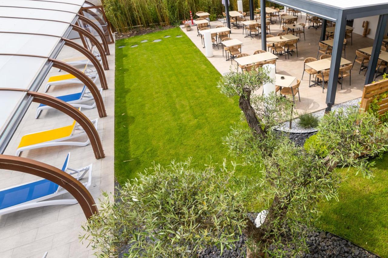 Logis Hotel Restaurant Le Clos Fleuri Кастельнодари Экстерьер фото